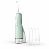 Irrigador dental Oria verde con sus 4 boquillas